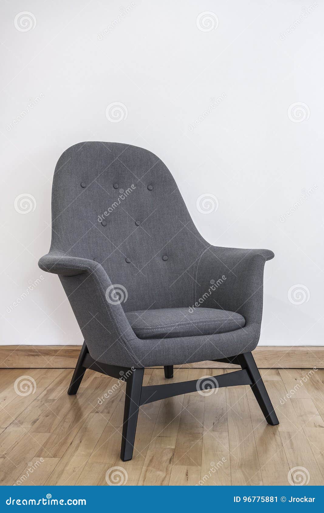 Modern grey armchair stock image. Image of buttons, armchair 96775881