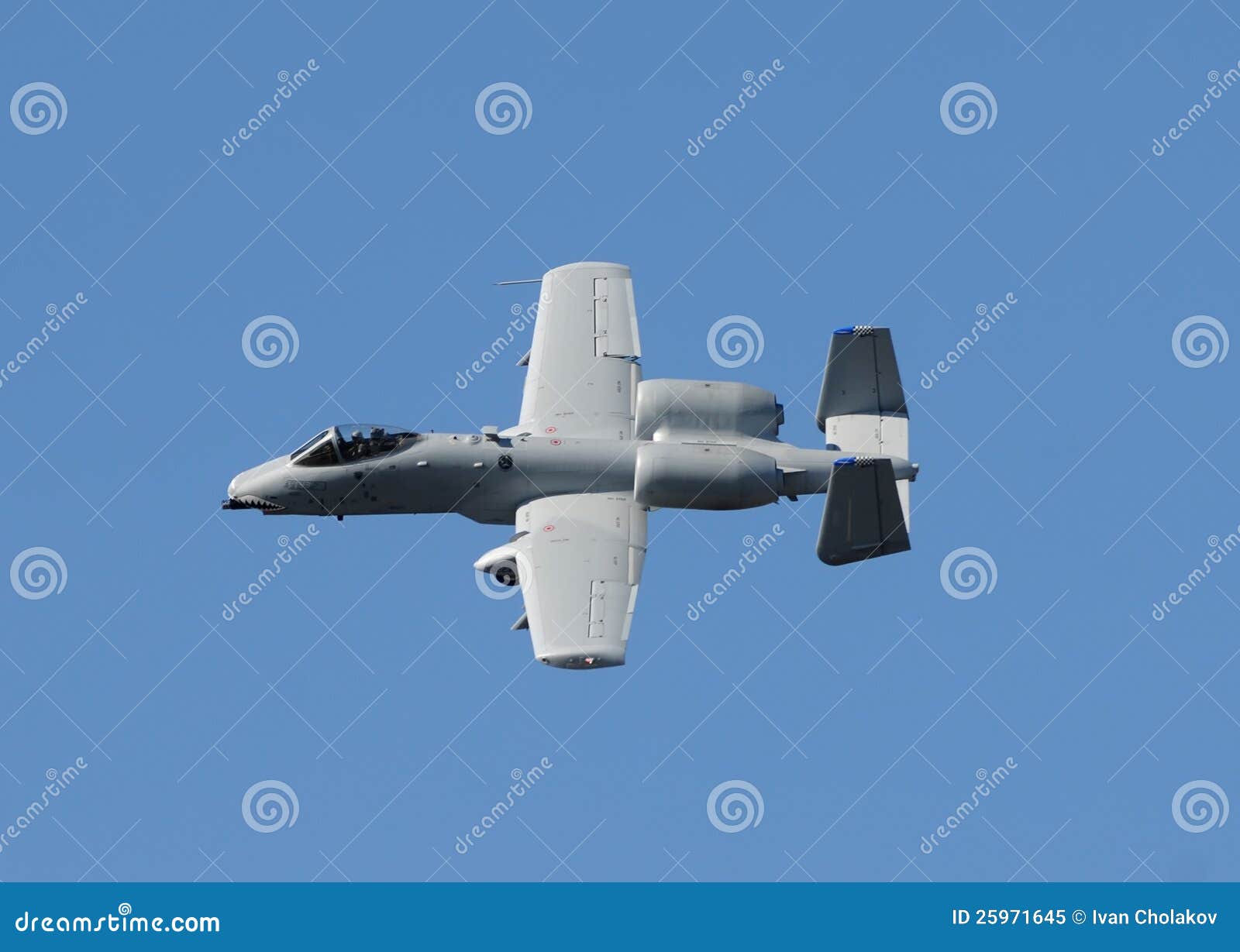 Modern gunship fighter jet against blue sky
