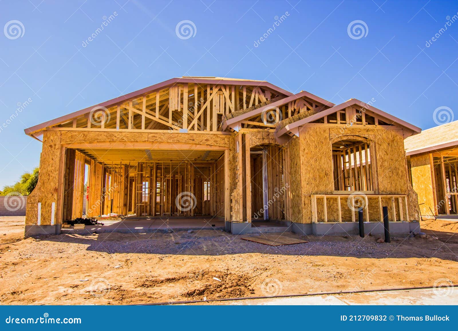 Modern Home during Framing & Plywood Construction Phase Stock Photo