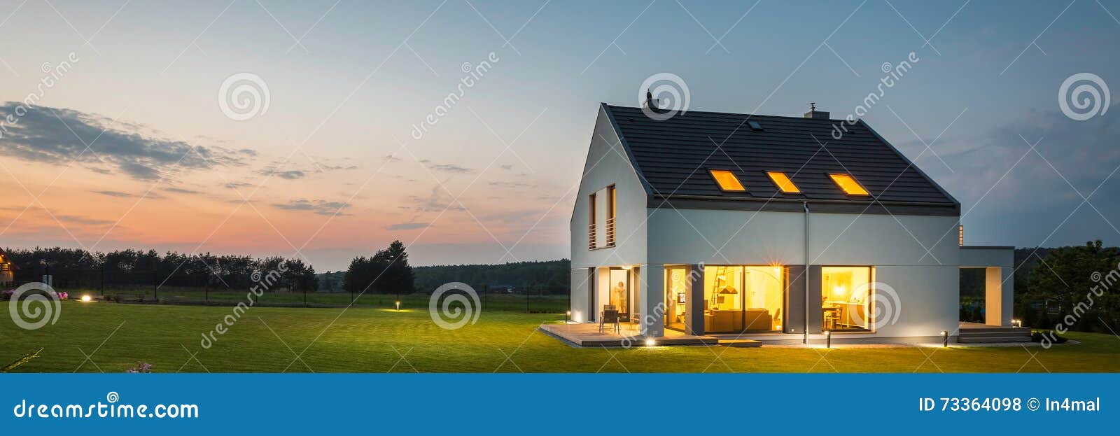 modern house with garden at night