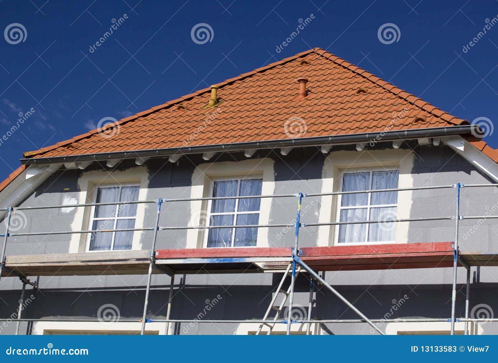 modern house and scaffolding