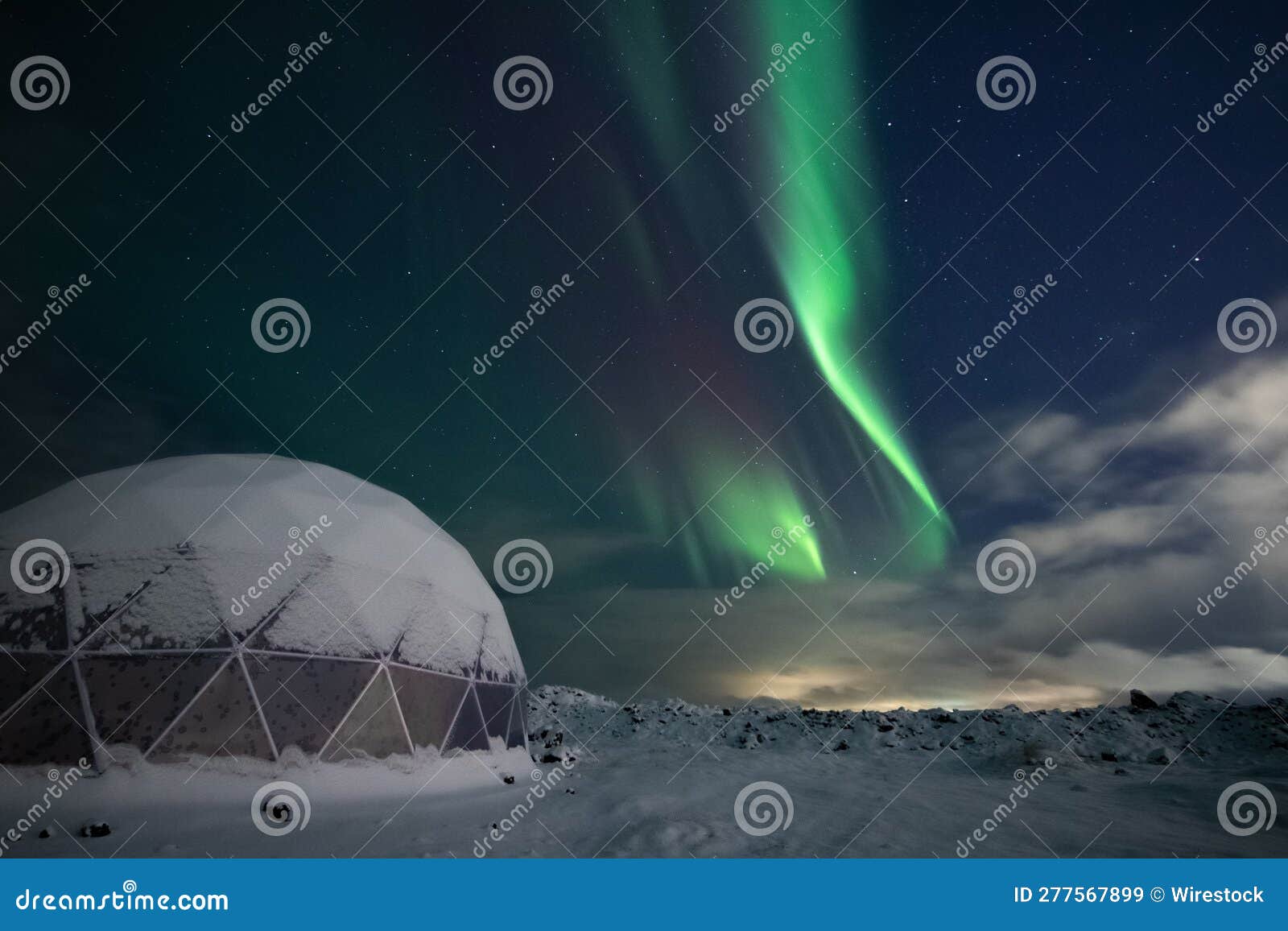 Modern Igloo Structure Illuminated the Northern Lights. Editorial Stock
