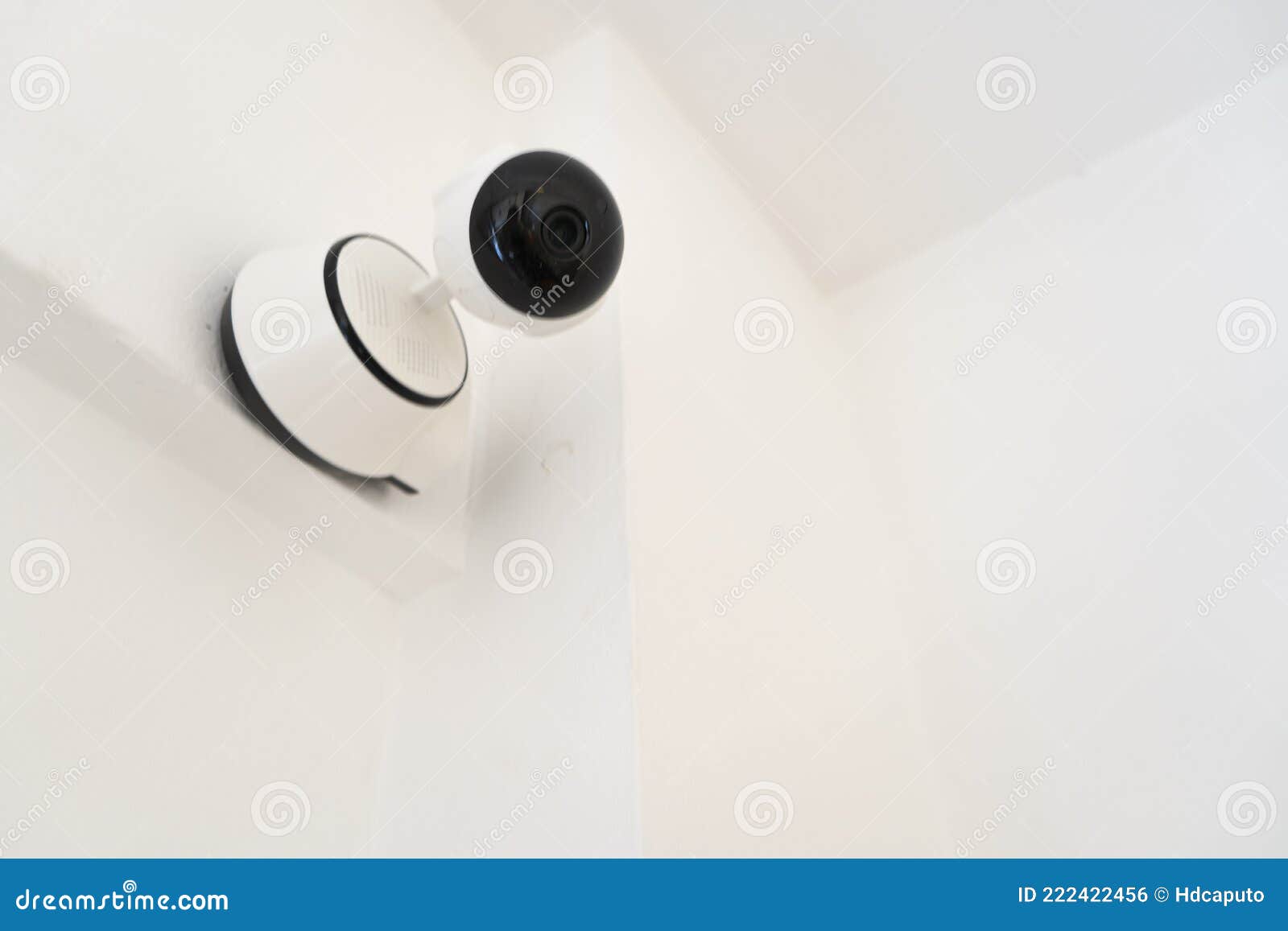 Modern Indoor Home Security or Surveillance Camera Installed on the