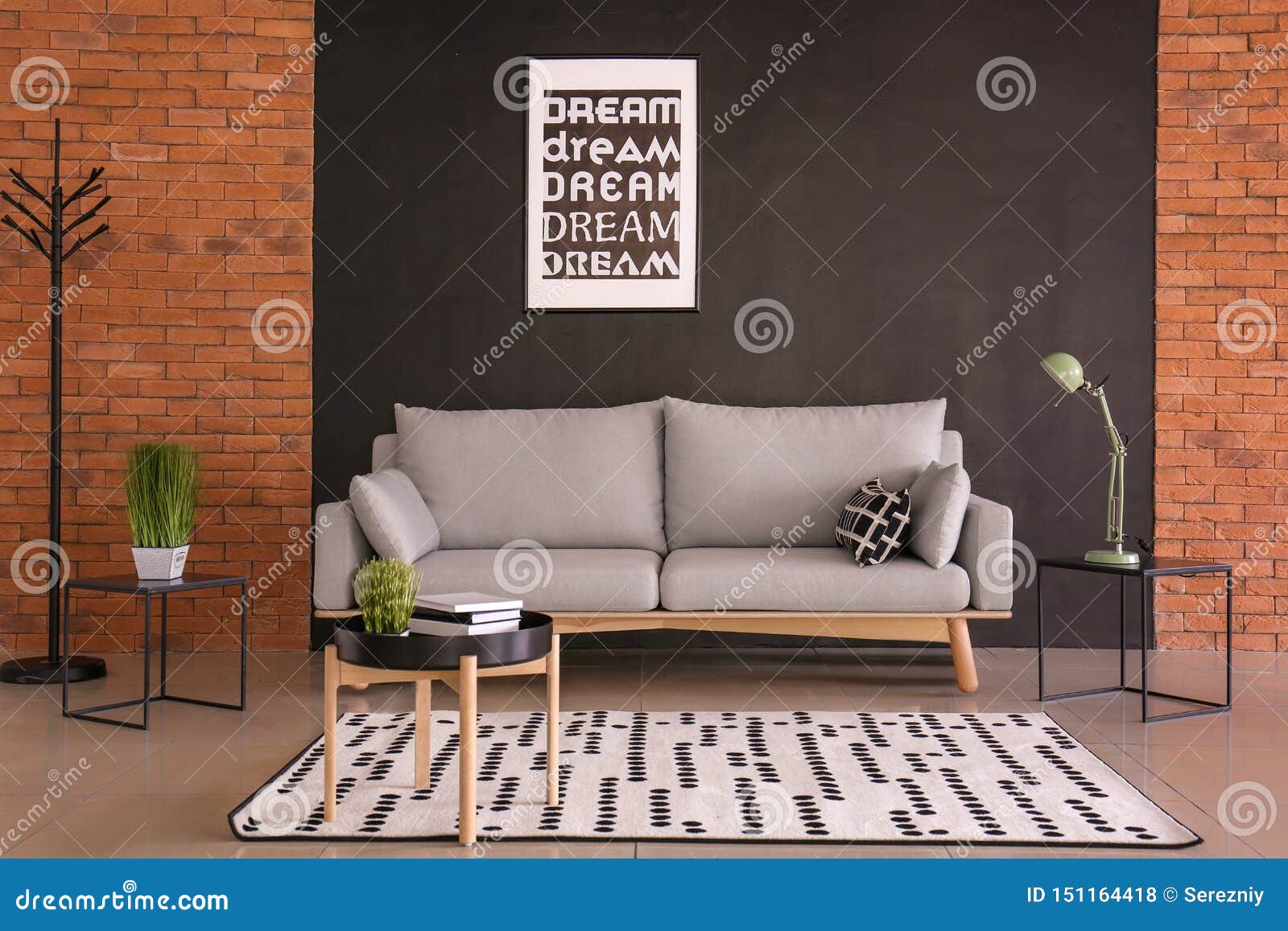 Modern Interior of Living Room with Comfortable Sofa Stock Photo