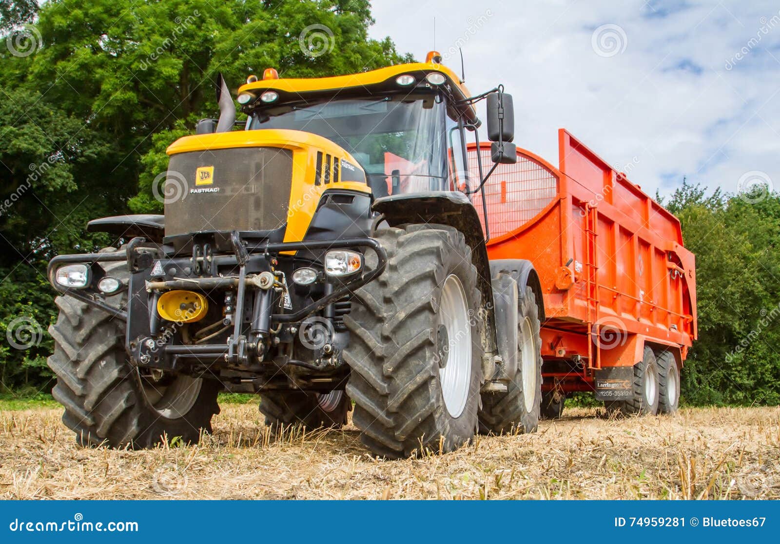 Modern Jcb Tractor Pulling Orange Trailer Editorial Photo Image of