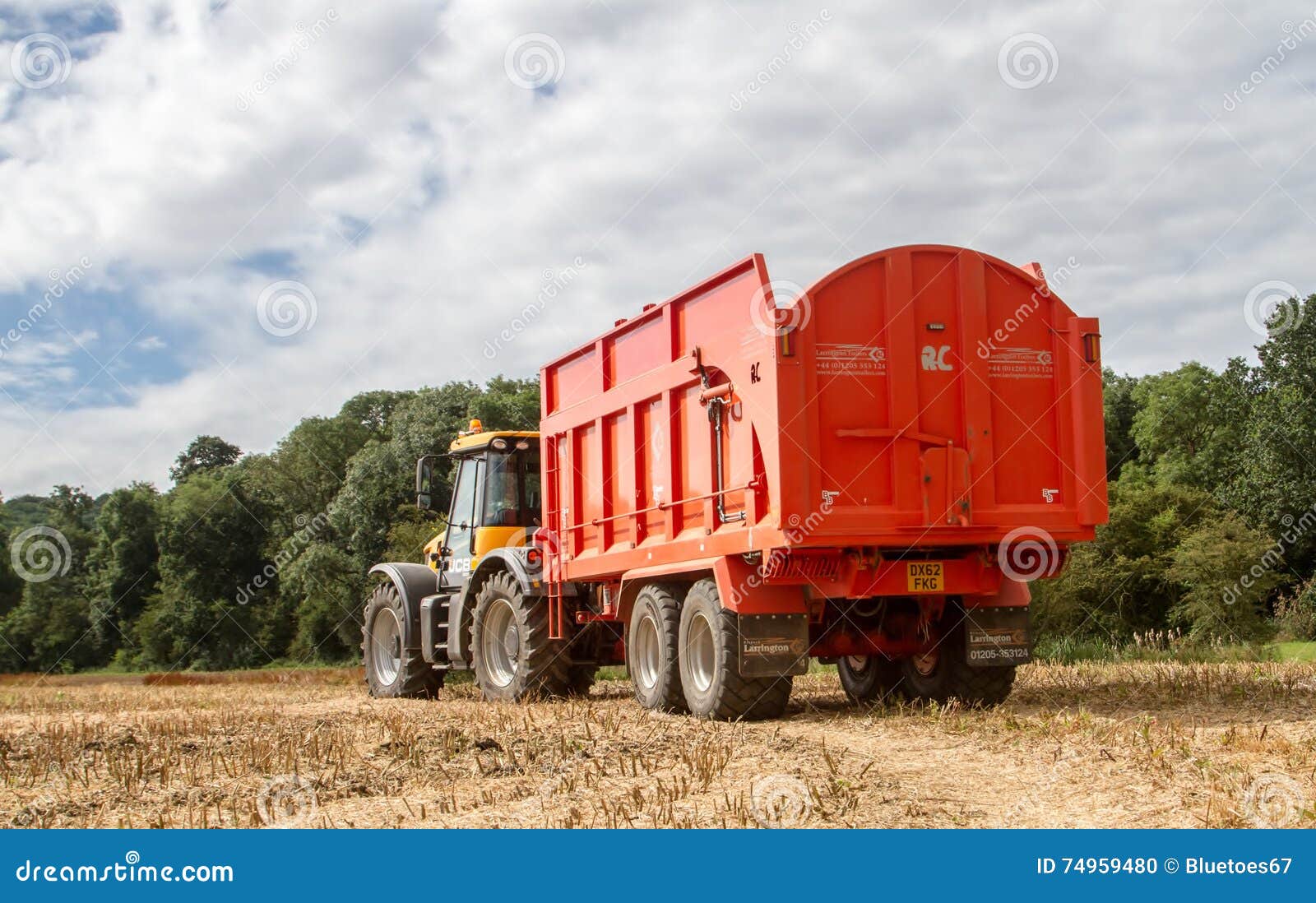Modern Jcb Tractor Pulling Orange Trailer Editorial Image Image of