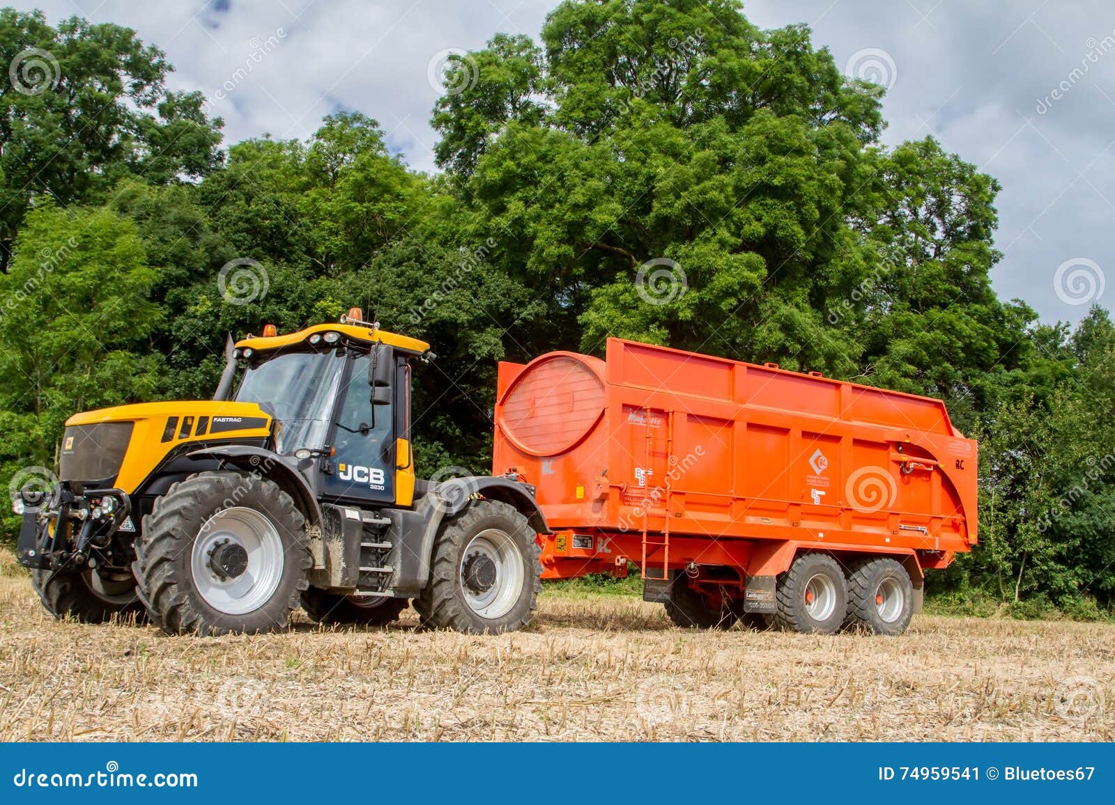 Modern Jcb Tractor Pulling Orange Trailer Editorial Photo Image of