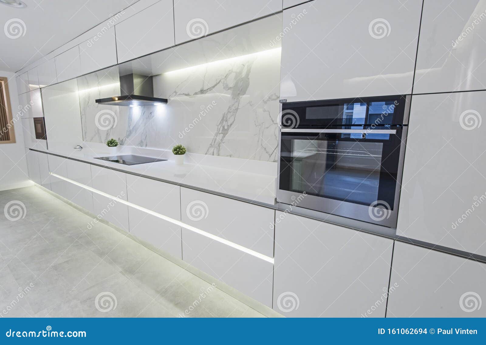 Modern Kitchen Design in a Luxury Apartment Stock Photo - Image of ...