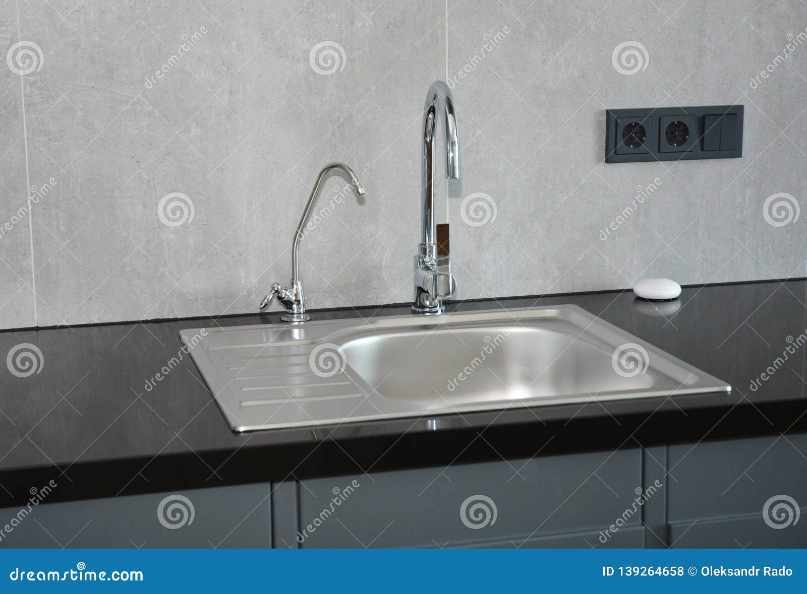 Modern Kitchen With Faucet And Metal Kitchen Sink And Outlets
