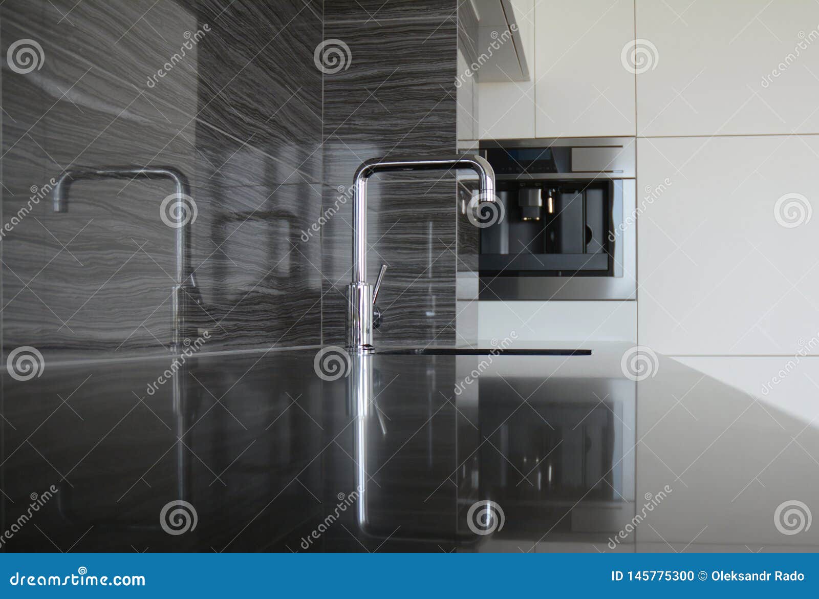 Modern Kitchen with Faucet and Kitchen Sink and Coffee Machine Stock