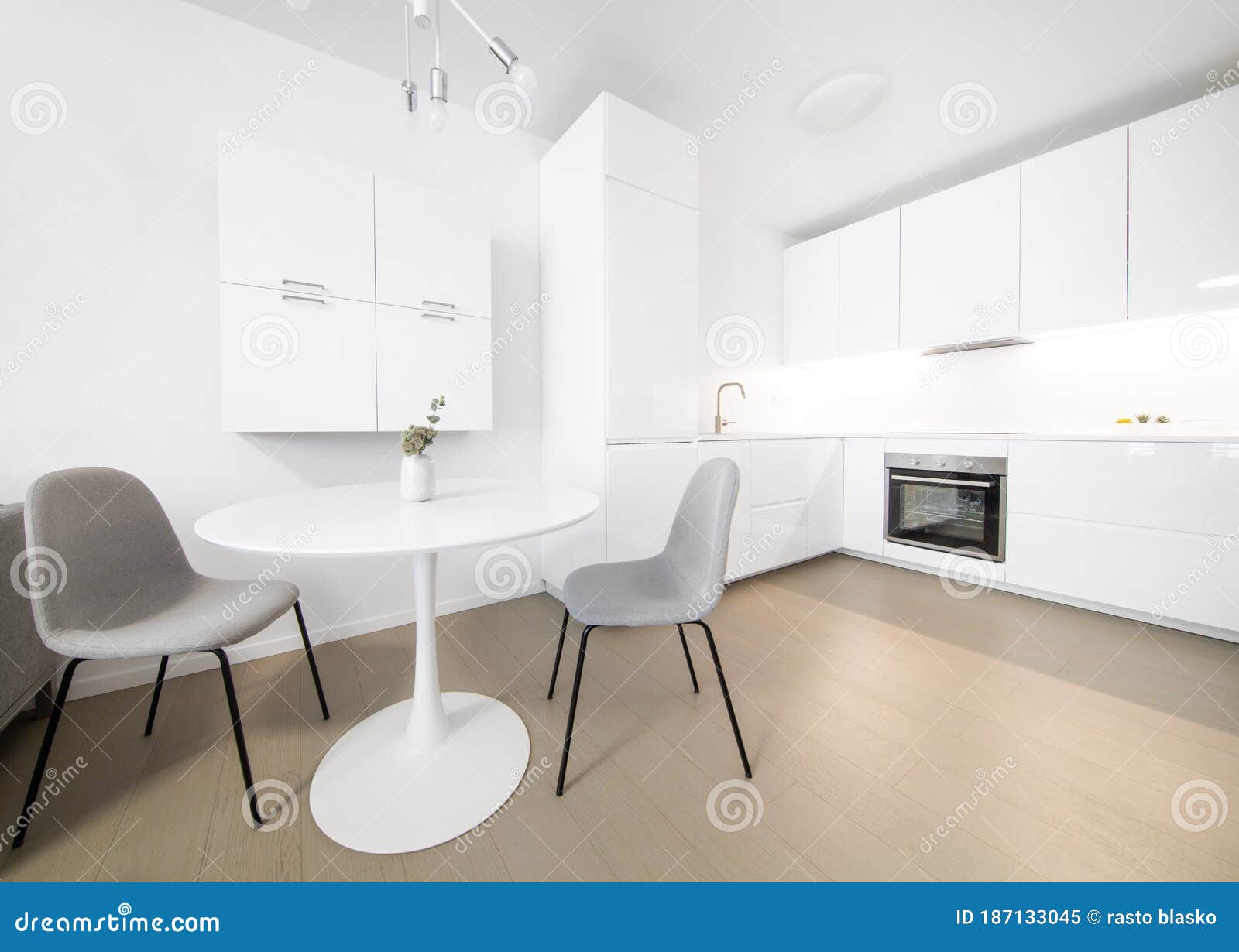 Modern Kitchen with Grey Chairs and White Walls Stock Image Image of
