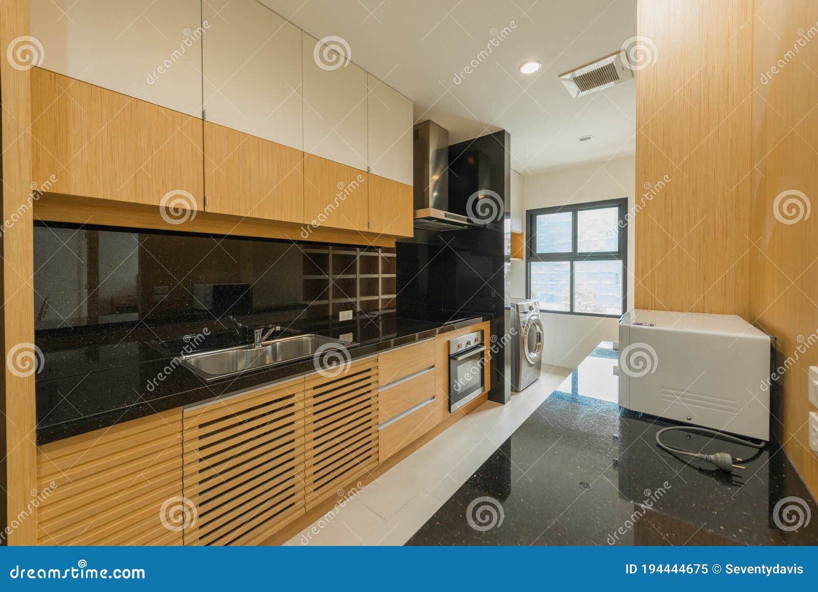 stylish kitchen interior with dining table and chairs