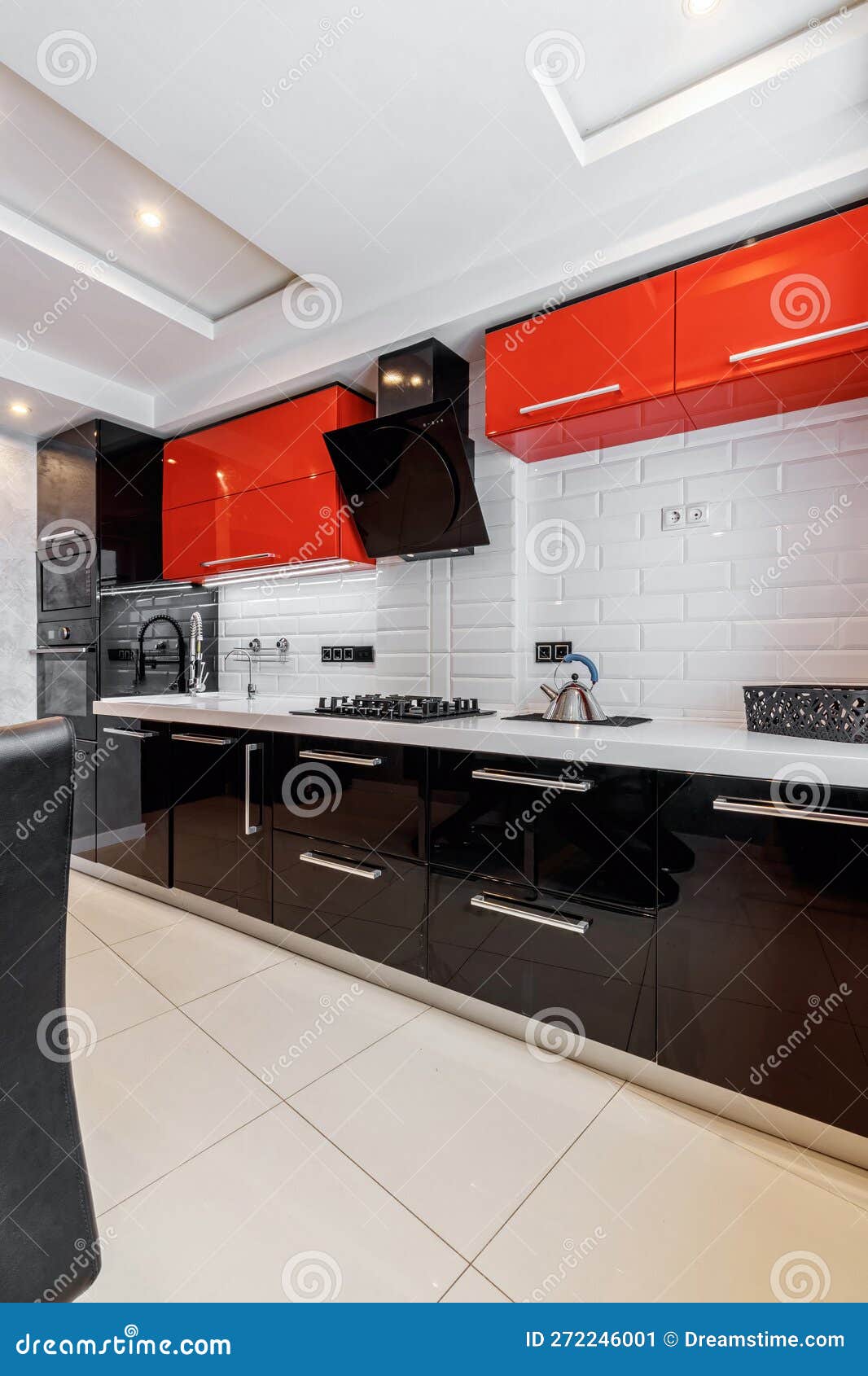 Modern Kitchen Interior with Red and Black Cabinets and White Ceramic