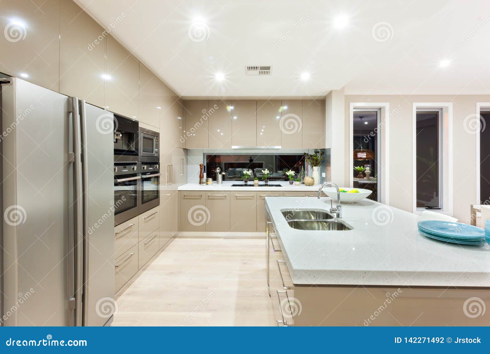 Modern Kitchen With Refrigerator And Fixed To The Wall With