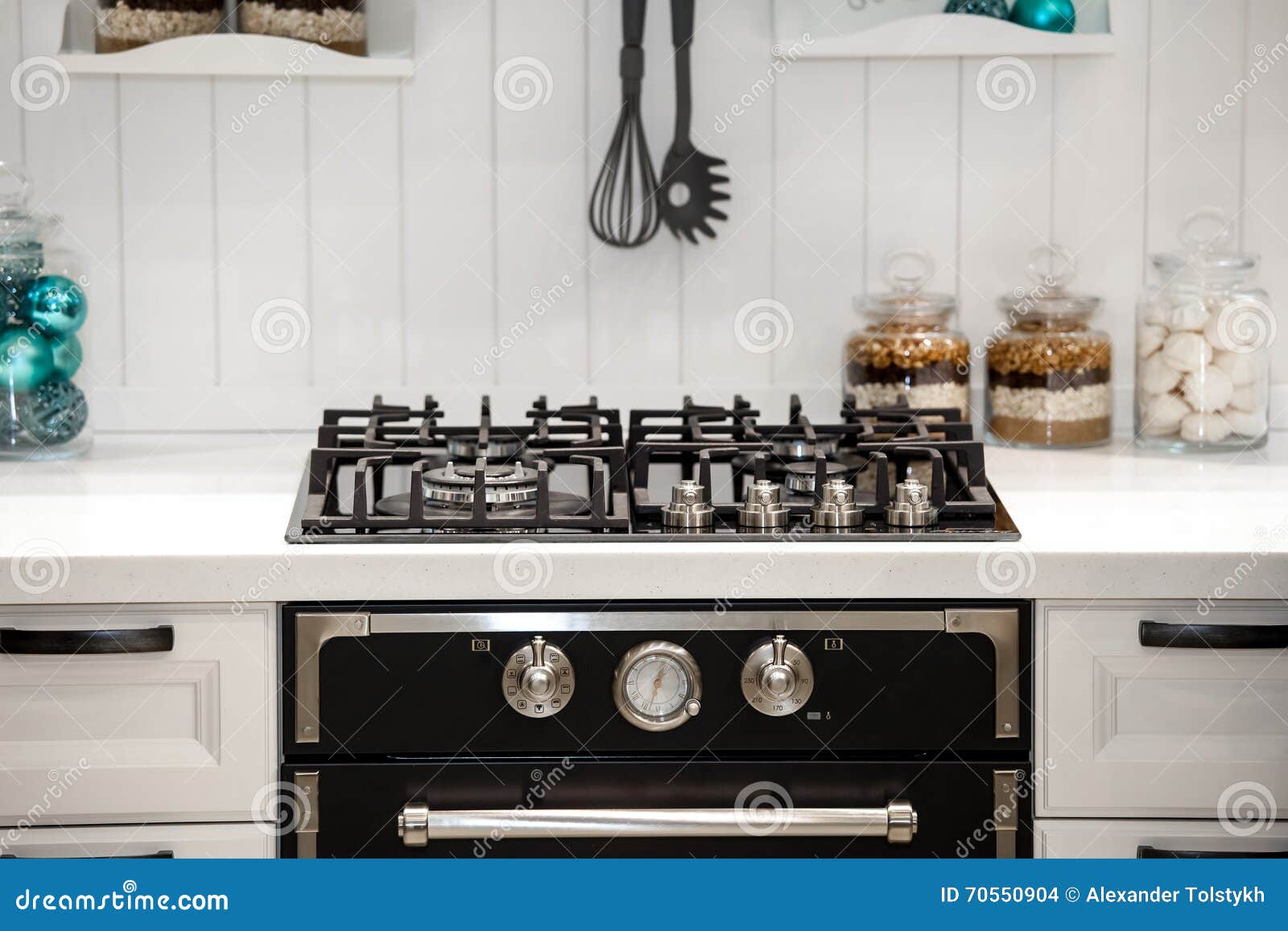 Modern kitchen and stove stock photo. Image of interior 70550904