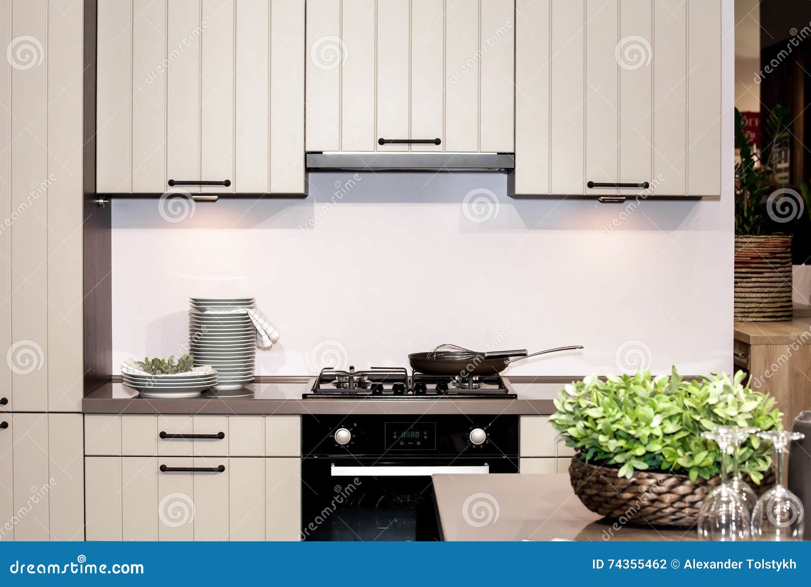 Modern kitchen and stove stock photo. Image of cookware 74355462