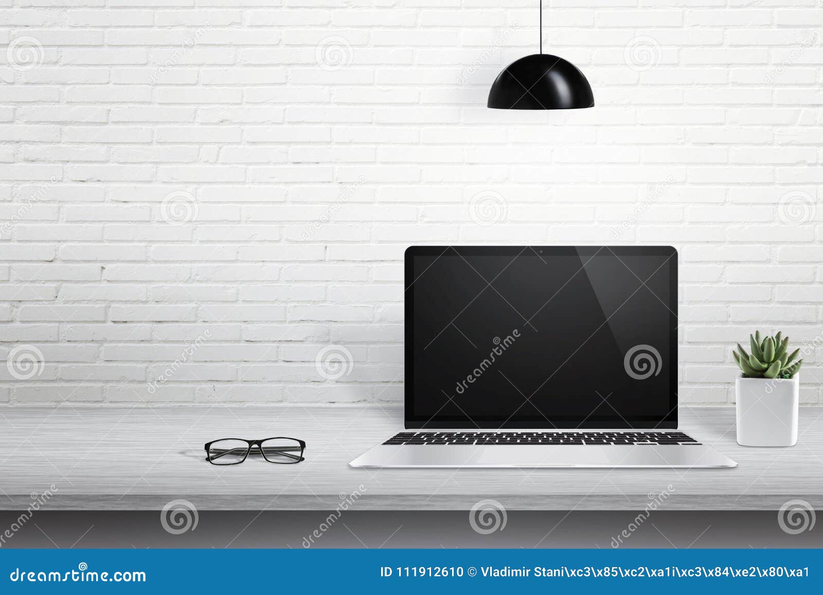 modern laptop computer on desk with blank screen for mockup