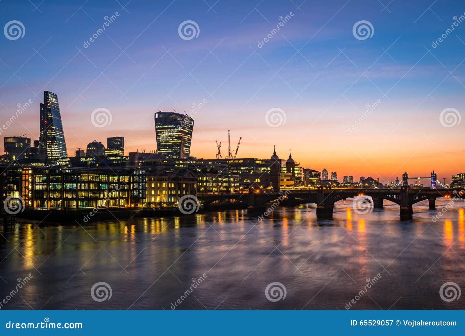modern london, morning photo with offices by the river thames