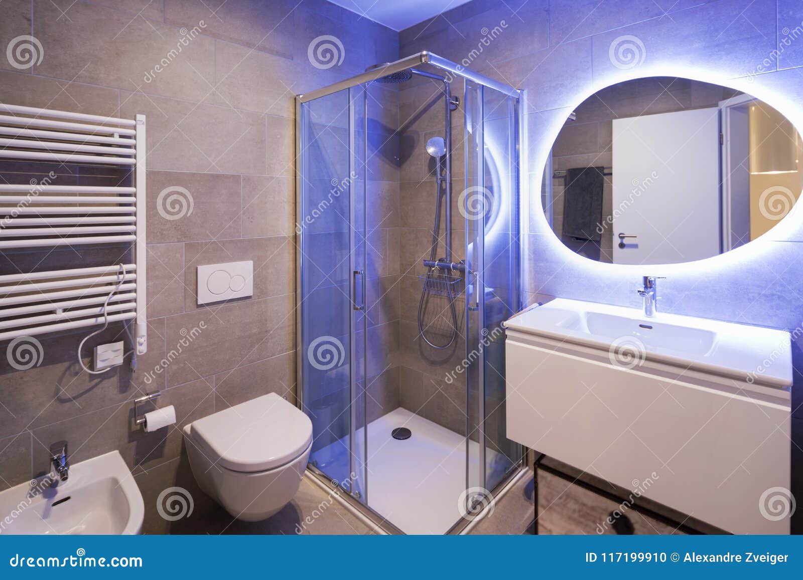 Modern Marble Bathroom with Backlit Mirror Stock Photo - Image of sink ...