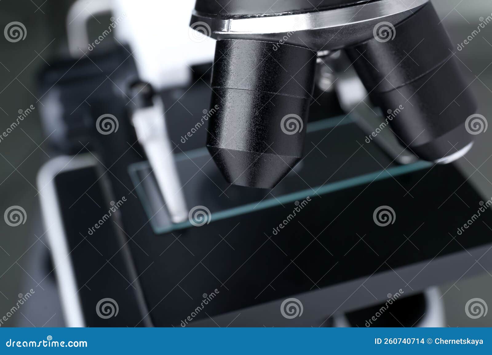 Modern Medical Microscope with Glass Slide, Closeup Stock Photo Image