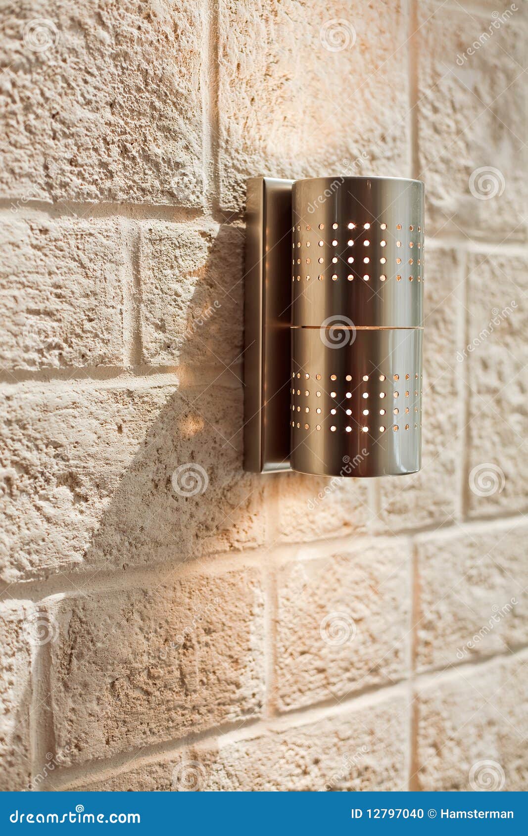 modern metal lamp on ashlar wall pattern