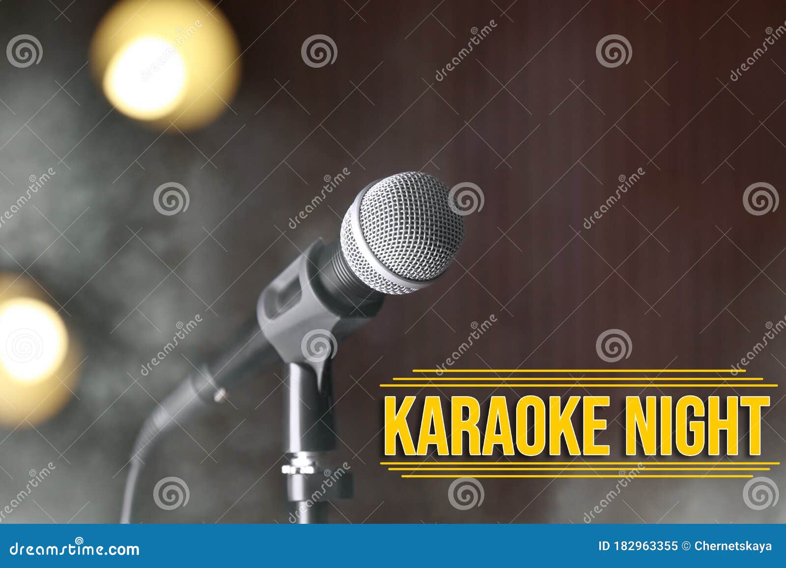Microphone and Text KARAOKE NIGHT on Dark Background Stock Image