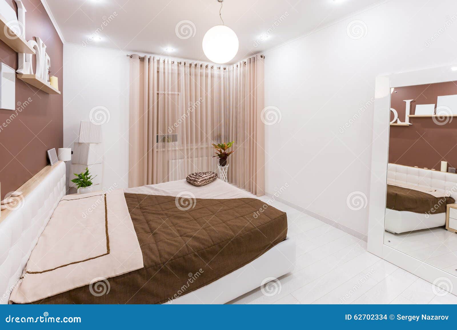 Modern Minimalism Style Bedroom Interior in Light Warm Tones Stock