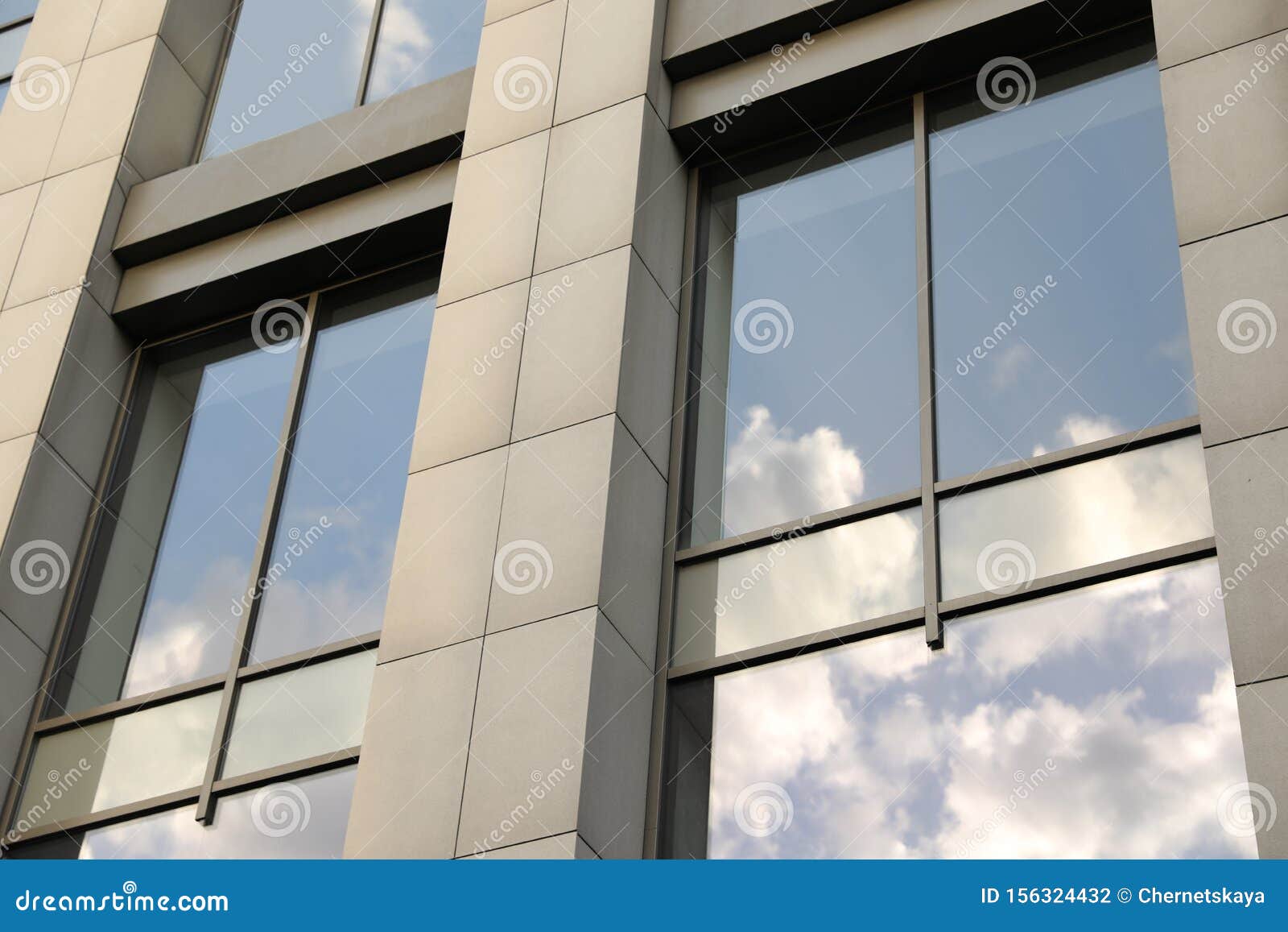 Modern Office Building with Tinted Windows. Architecture Stock Photo
