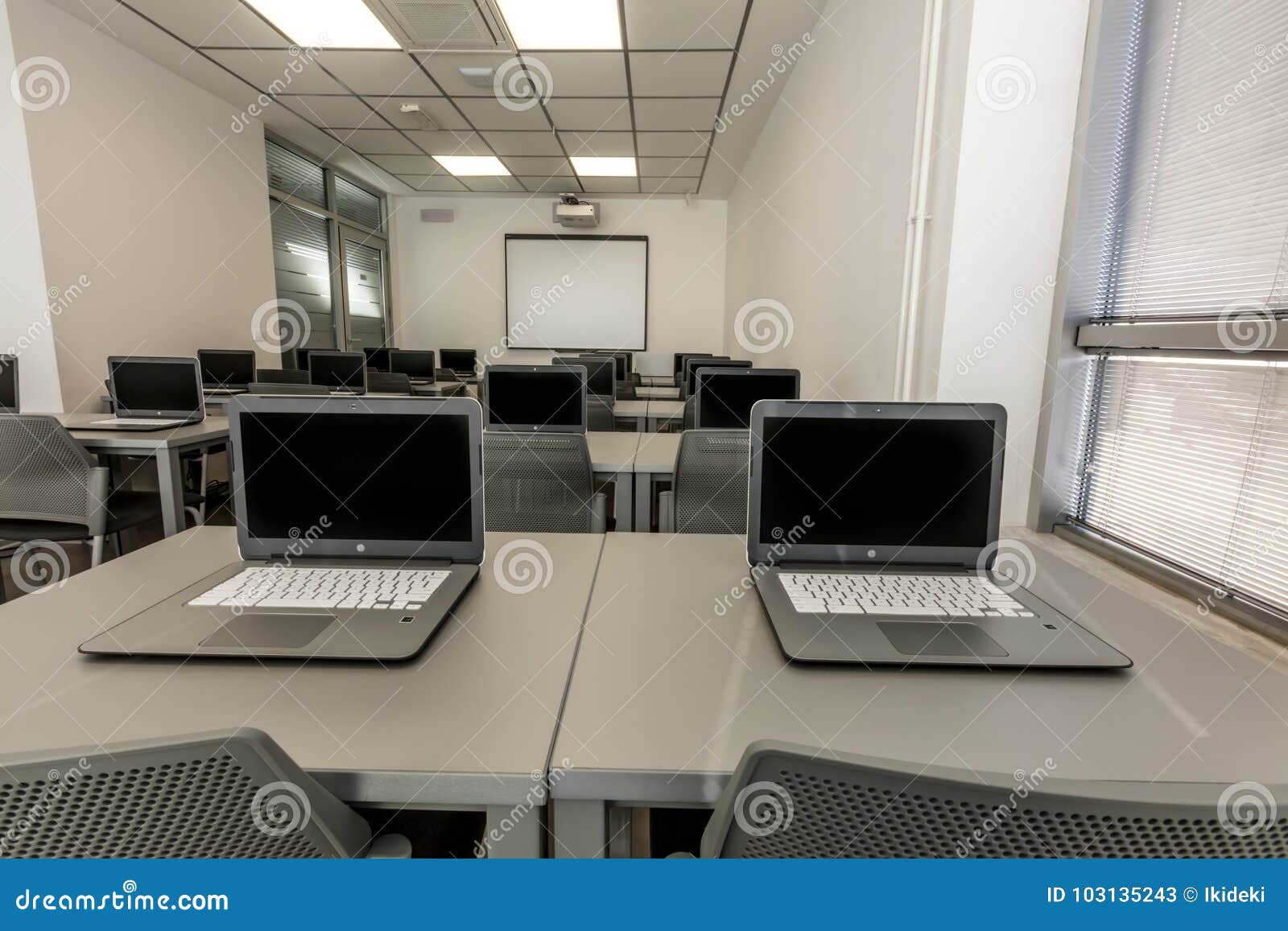 Modern Office Work Desks With Laptops In Depth Photography Stock