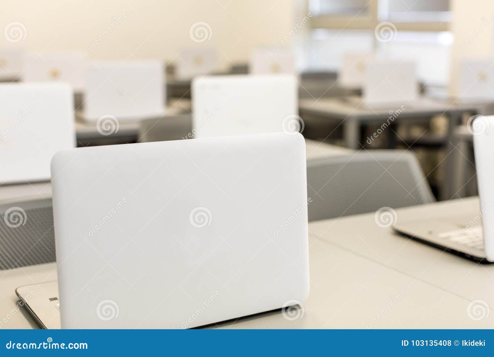 Modern Office Work Desks With Laptops In Depth Photography Stock