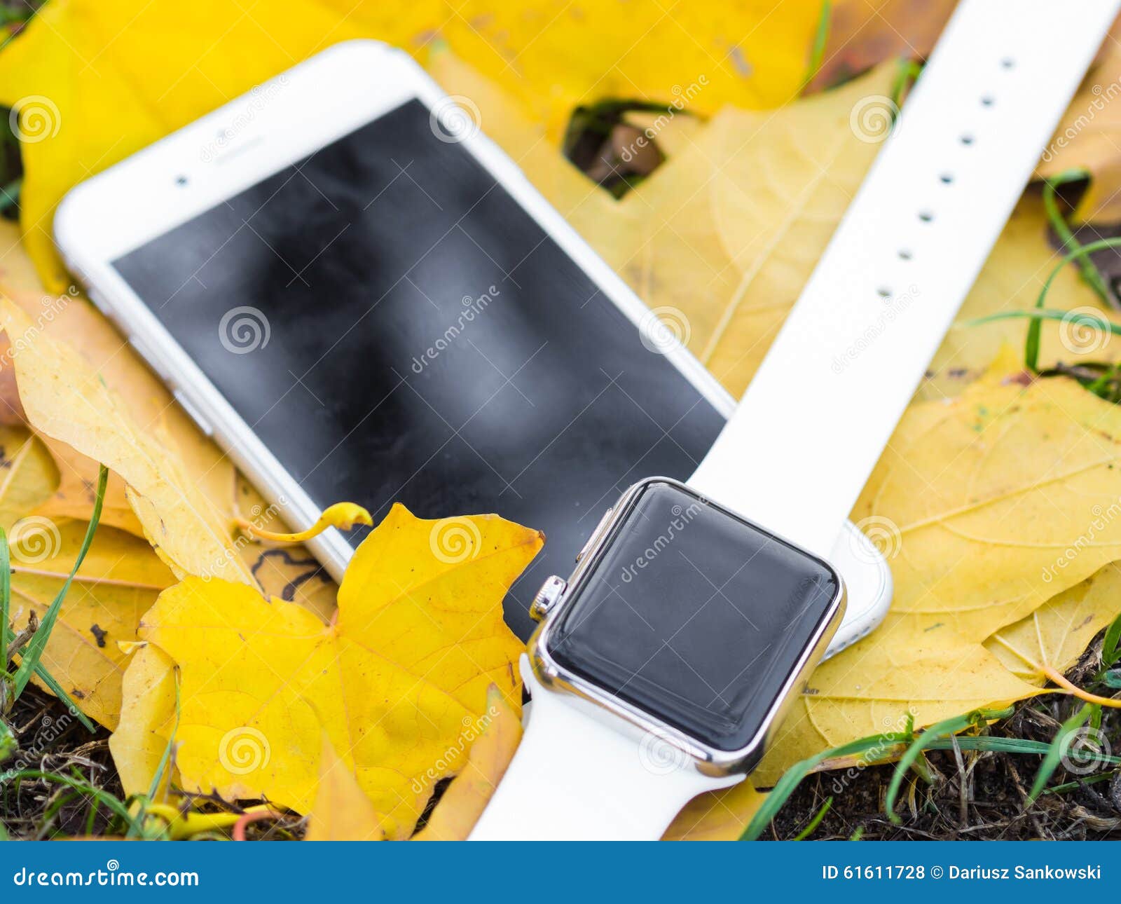 Modern phone and a watch stock photo. Image of light 61611728