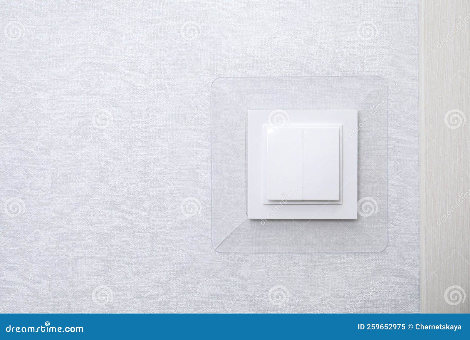 Modern Plastic Light Switch on White Wall, Space for Text Stock Image