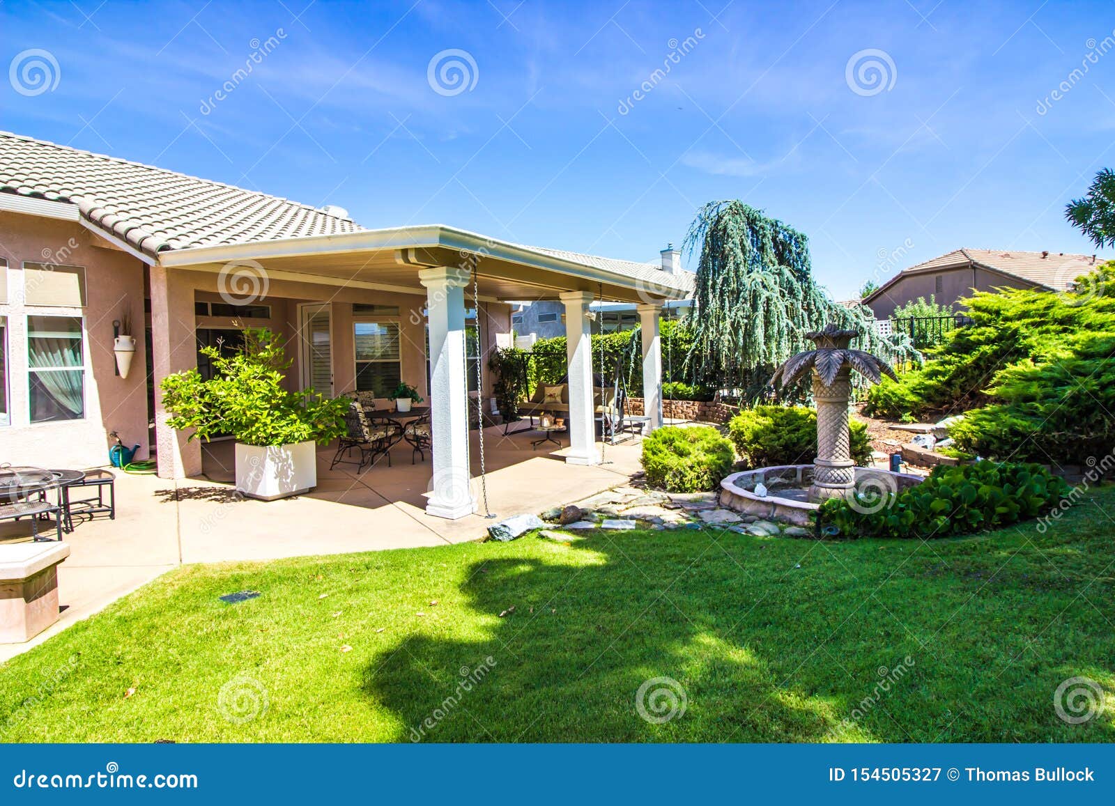 Modern Rear Yard Patio Setting with Fountain Stock Image Image of