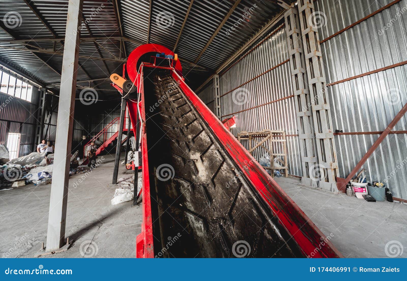 At Modern Recycling Plant. Conveyor Belt for Transports Garbage Stock