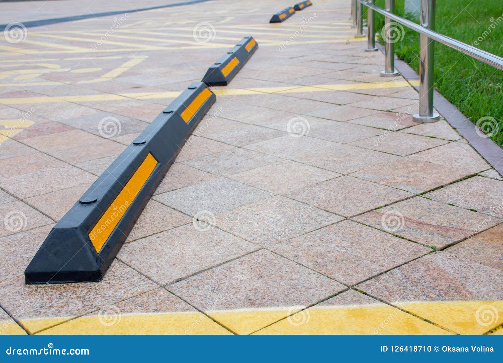 Modern Rubber Barrier for Cars in Summer Parking in the Street Stock ...