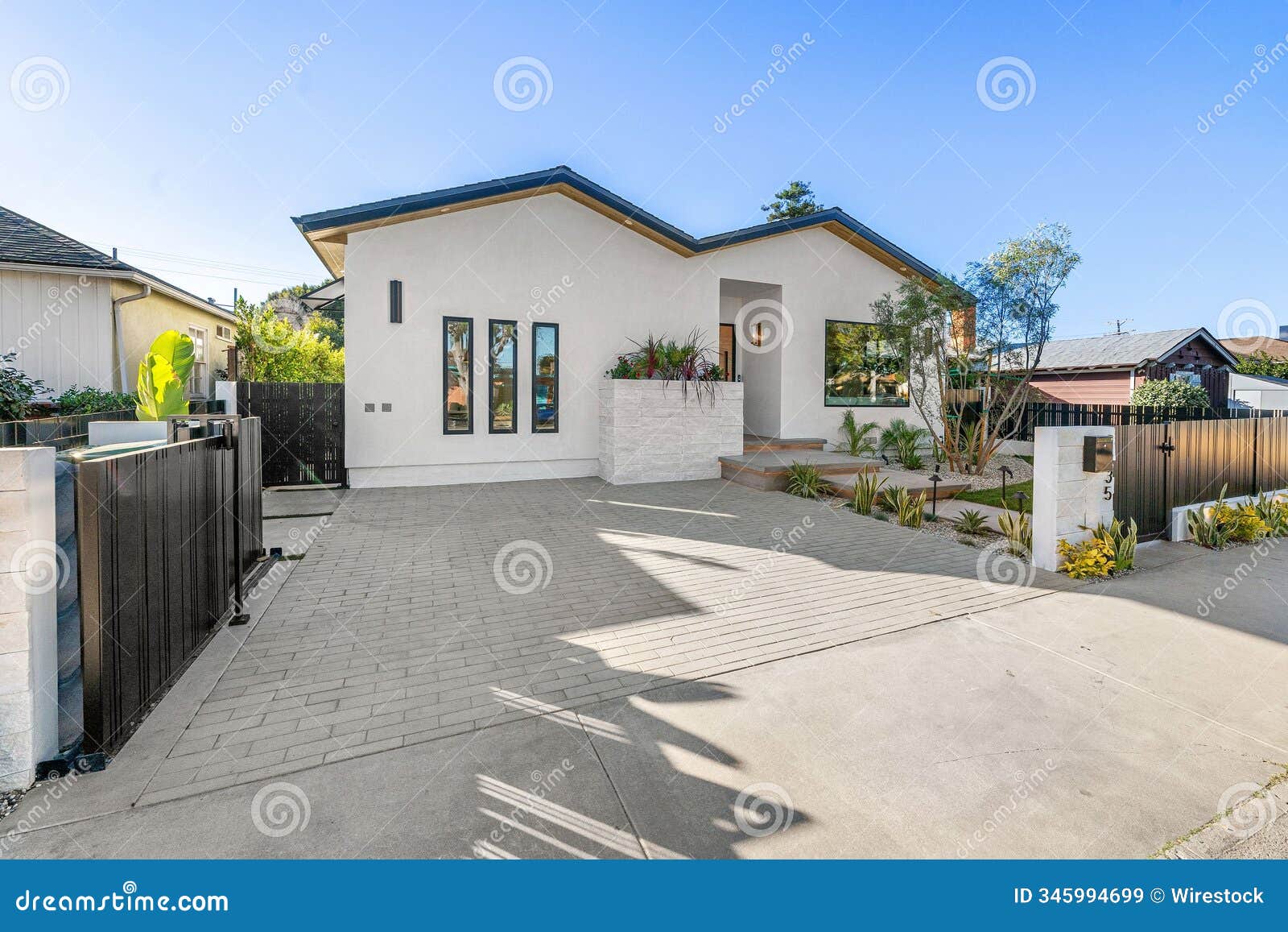 modern single-story suburban house with minimalist .