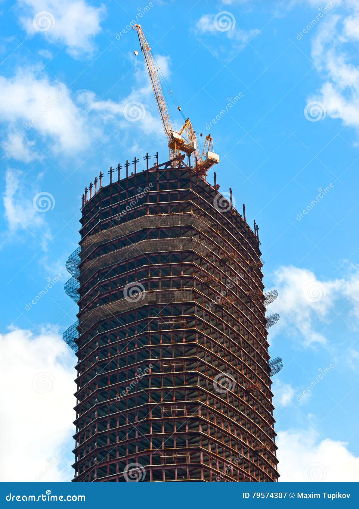 modern skycraper housebuilding and crane at moscow