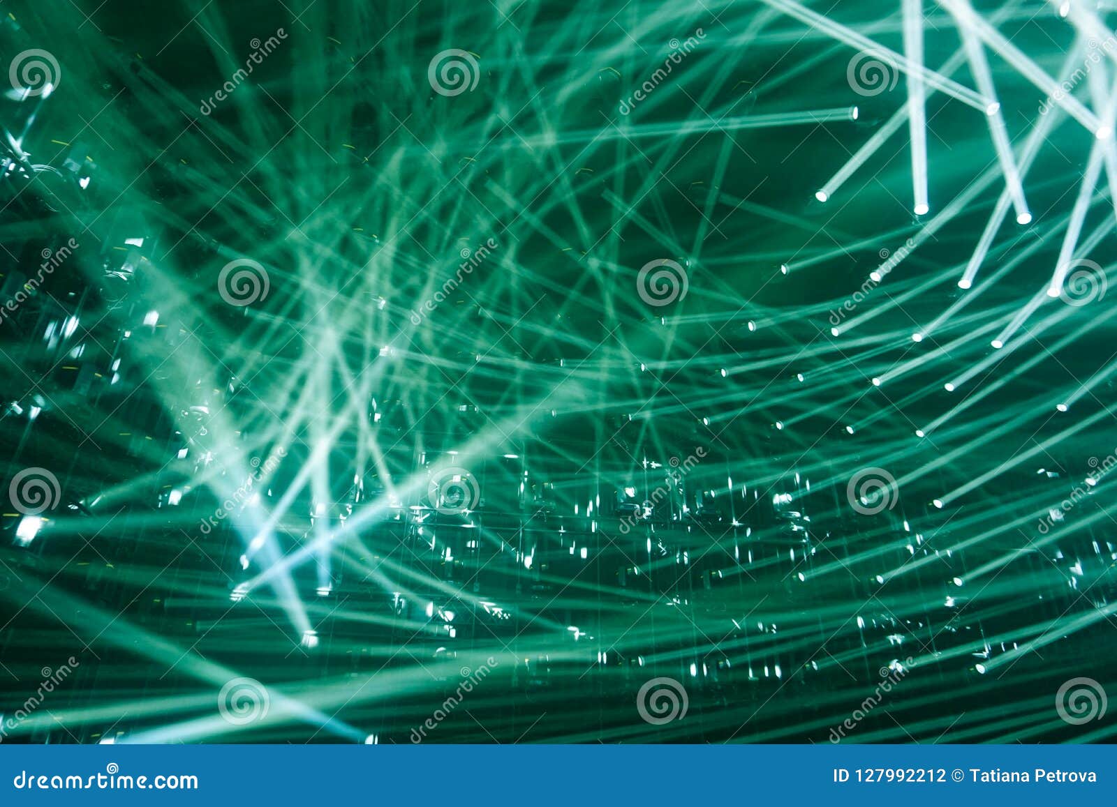 Modern Spotlights. Green Color Rays of Light Background Stock Photo