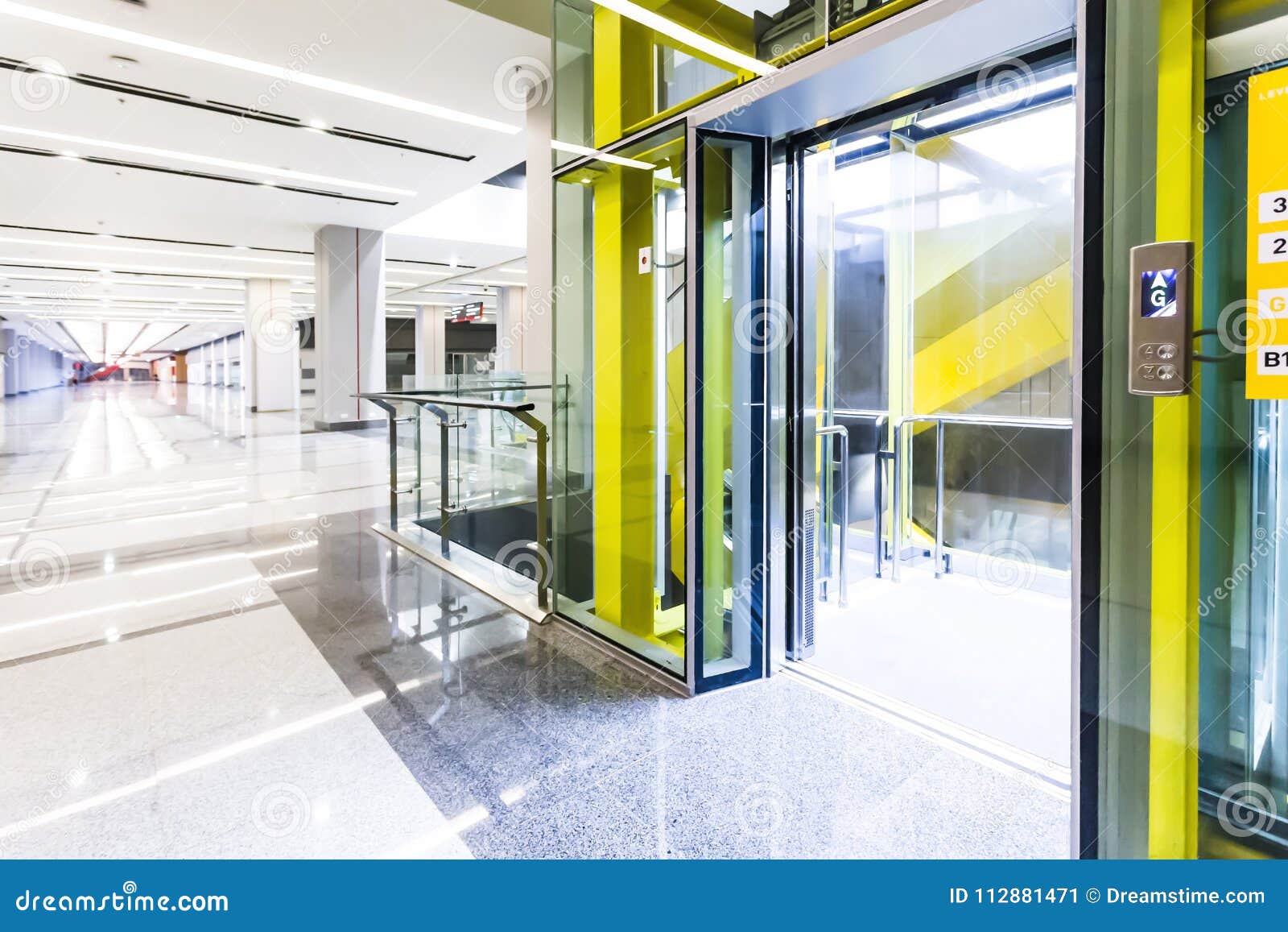 Modern Steel Elevator Doors Cabins in a Business Lobby or Hotel, Store