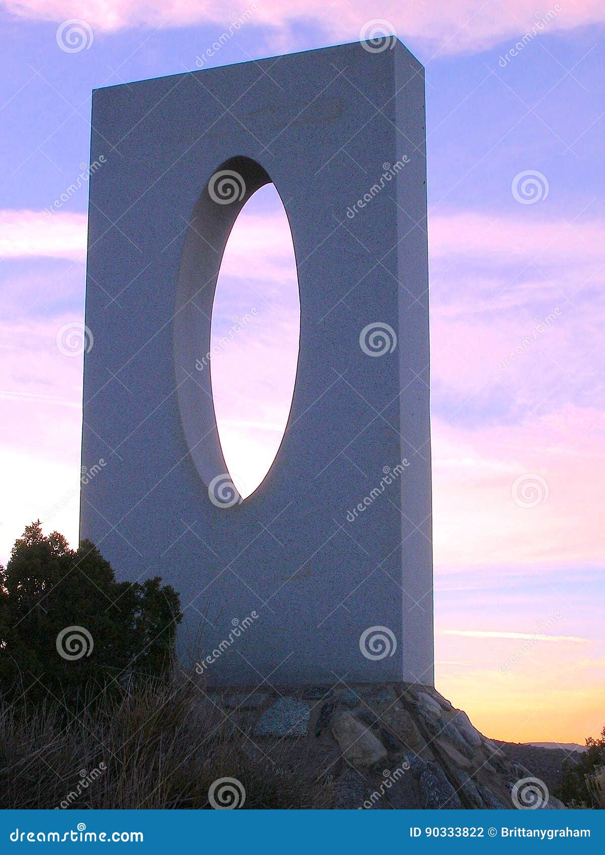 modern stone sculpture at sunset