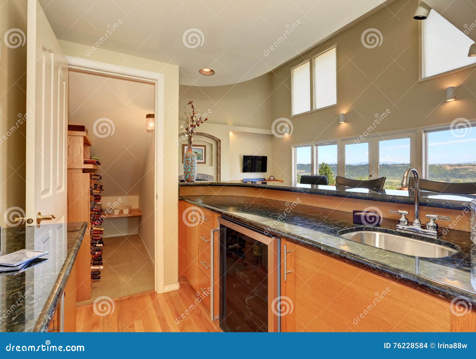 Modern Style Kitchen Interior with Wine Storage Room Stock Photo