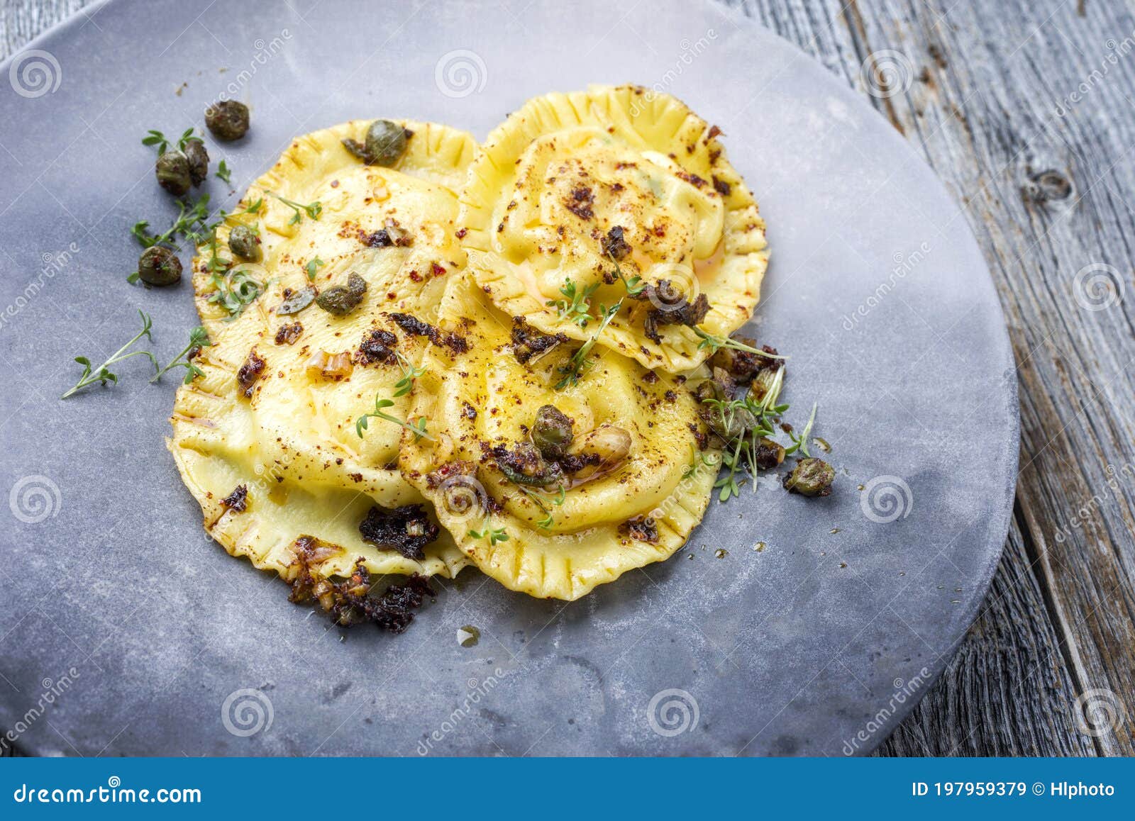 Download Modern Style Traditional Italian Ravioli Pasta With Capers And Onion Chili Pesto On A Design Plate Stock Image Image Of Dish Board 197959379