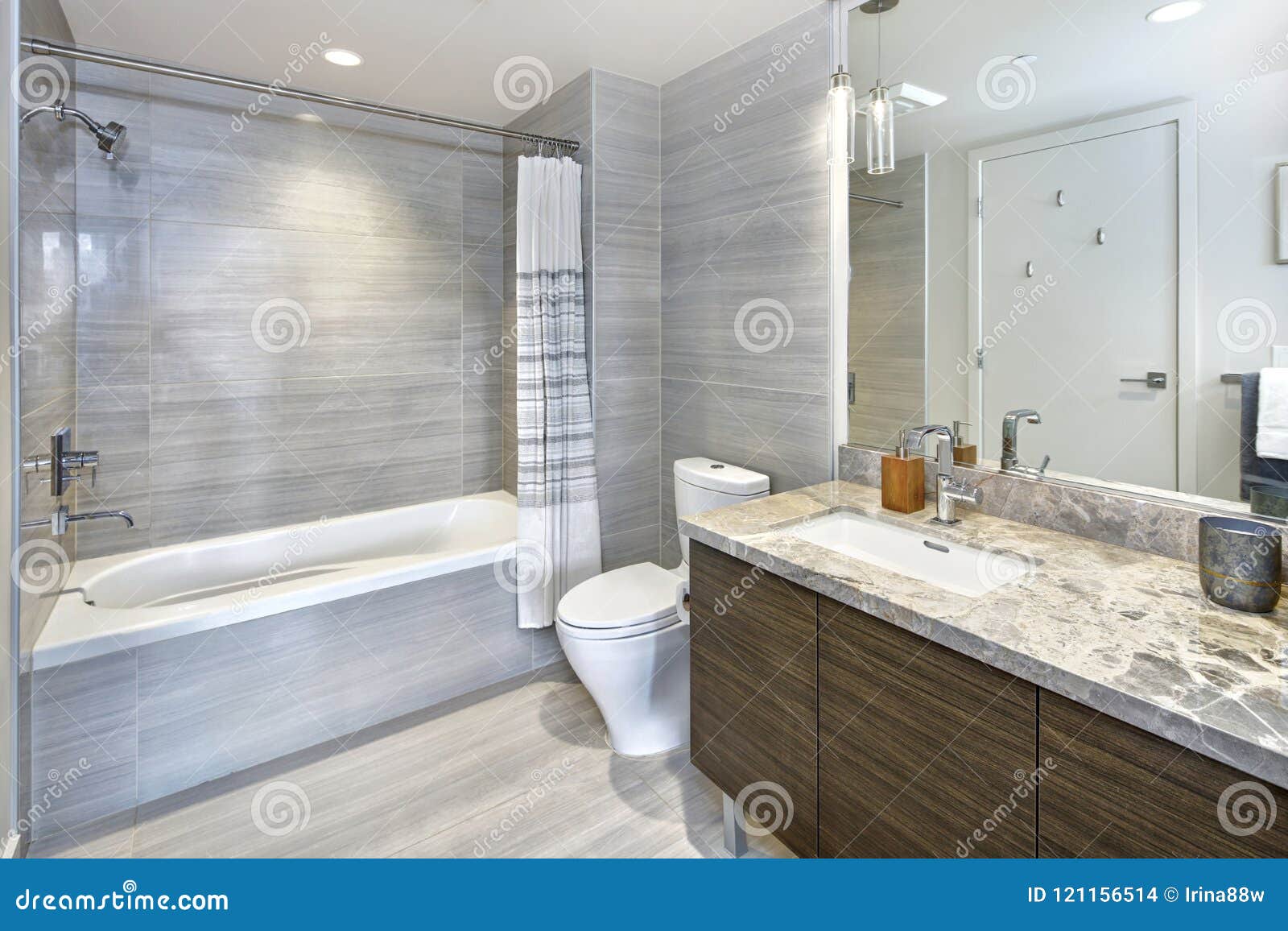 modern stylish condo bathroom  with gray tiling