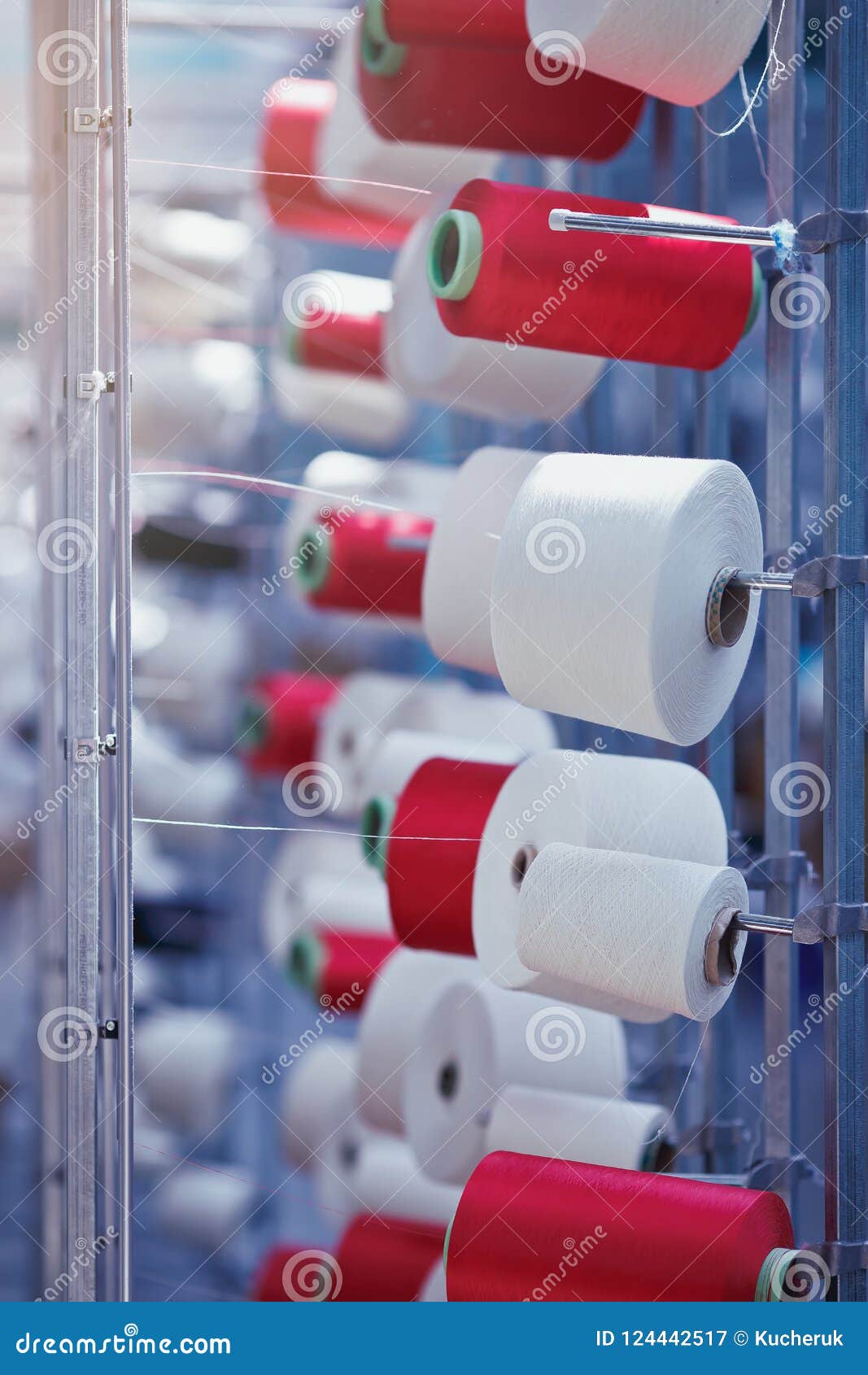 Row Of Automated Machines For Yarn Manufacturing. Modern Textile Plant.  Textile Manufacturing Of Synthetic Fibers. Stock Photo, Picture and Royalty  Free Image. Image 51246219.