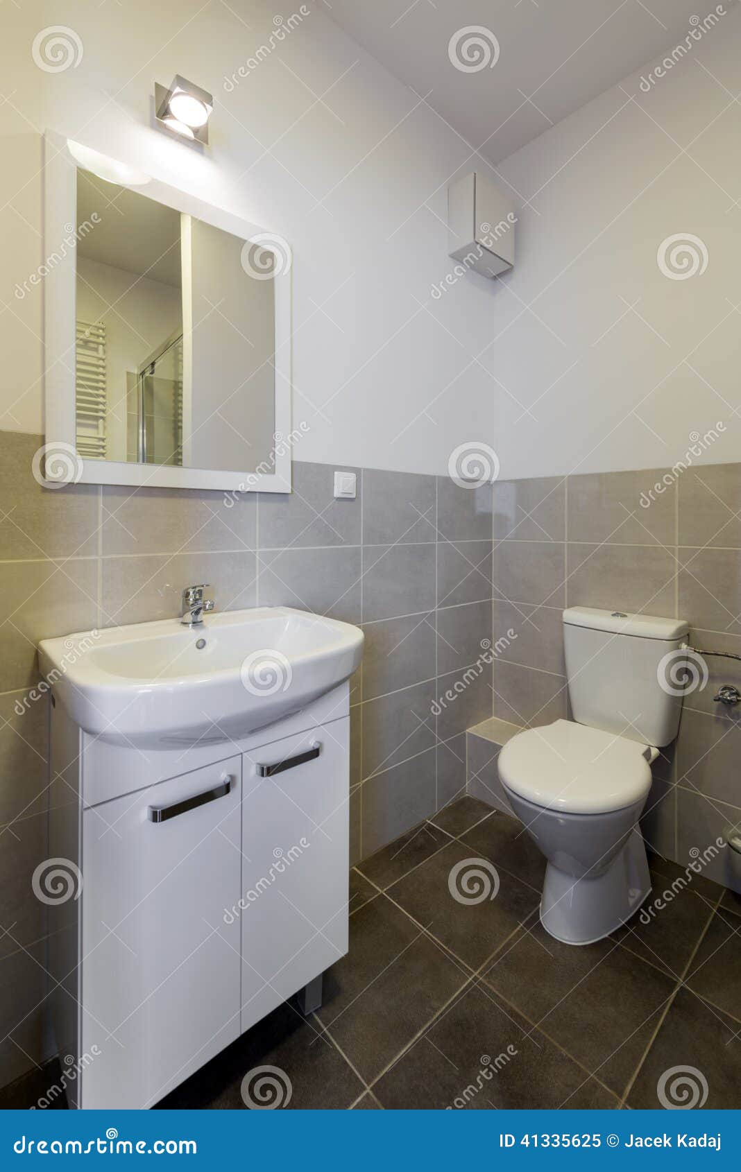 Modern Tiled Bathroom with Toilet, Sink and Mirror Stock Image Image