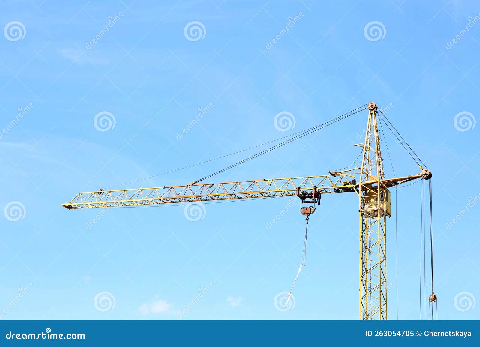 Modern Tower Crane Against Blue Sky. Construction Site Stock Image