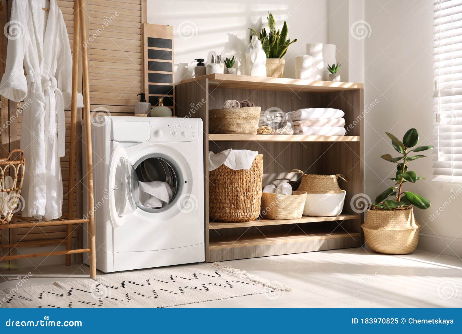 Washing Machine and Shelving Unit in Laundry Room Interior Stock Image