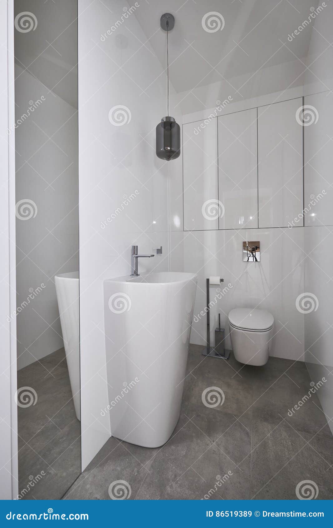 Modern Water Closet with Miror and White Walls Editorial Stock Image