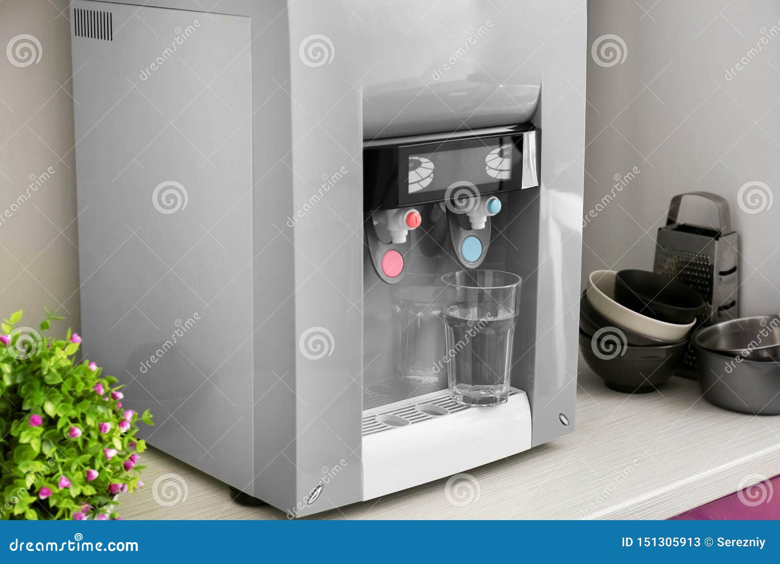 Modern Water Cooler with Glass on Kitchen Table Stock Image Image of
