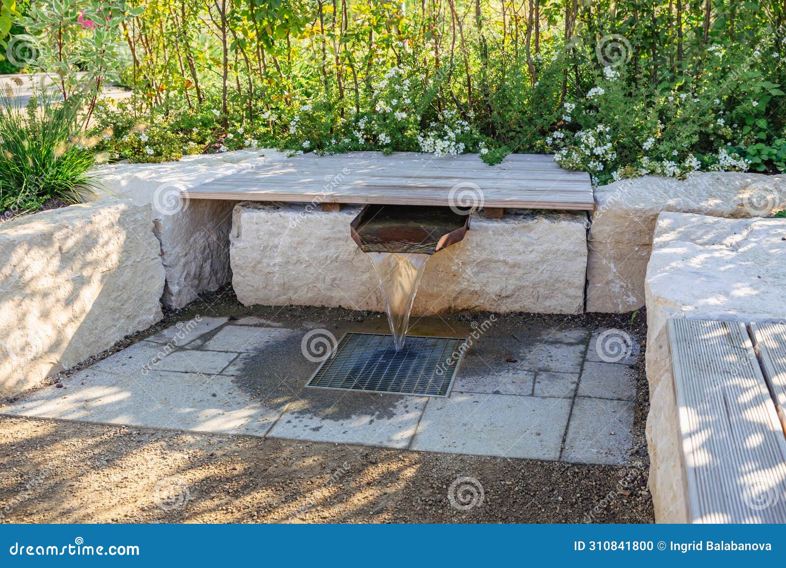 modern water  with sitting area in a garden, patio or city park